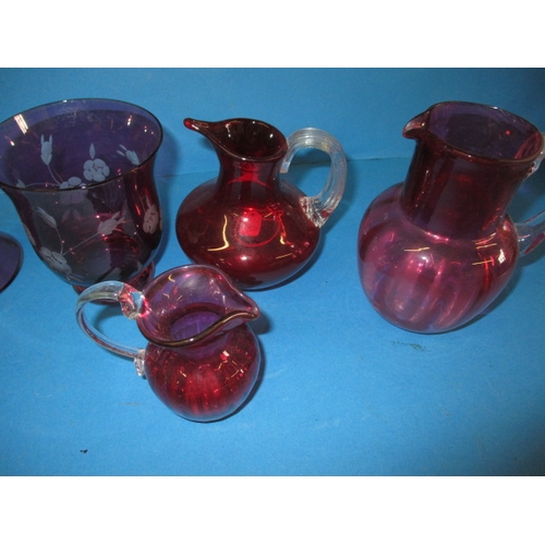 204 - A parcel of vintage cranberry glass items, all in pre-owned condition, one with crack to neck all ot... 