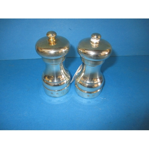 144 - Sterling silver salt and pepper grinders, approx. height 10cm in useable pre-owned condition