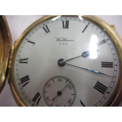 70 - A vintage Waltham gold plated pocket watch with albert chain, runs when wound with use-related marks