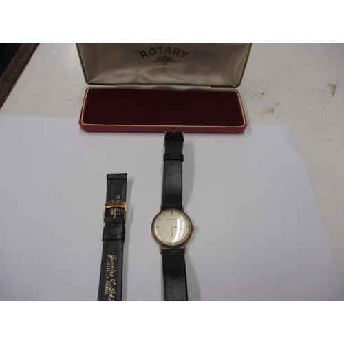 72 - A vintage Rotary wrist watch, runs when wound, believed to be a gold body, having replacement strap ... 