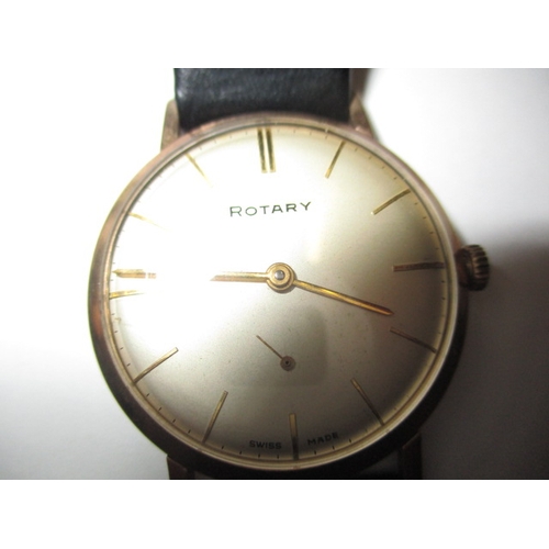 72 - A vintage Rotary wrist watch, runs when wound, believed to be a gold body, having replacement strap ... 