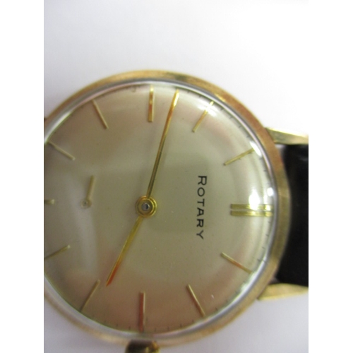 72 - A vintage Rotary wrist watch, runs when wound, believed to be a gold body, having replacement strap ... 