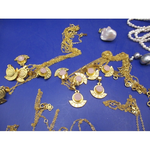 161 - A parcel of costume jewellery ,to include Turkish yellow metal necklaces and cultured pearls, all in... 