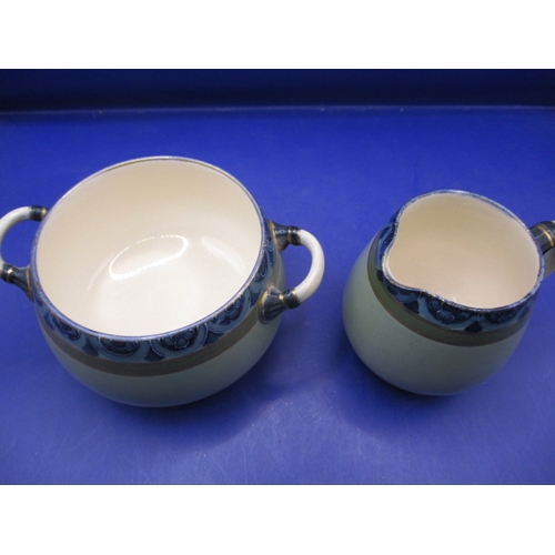 187 - A Macintyre cream jug and sugar bowl both with Burslem back stamps’, both with no observed damage or... 