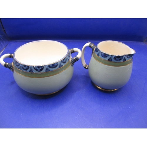 187 - A Macintyre cream jug and sugar bowl both with Burslem back stamps’, both with no observed damage or... 