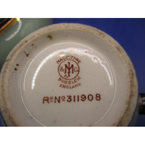 187 - A Macintyre cream jug and sugar bowl both with Burslem back stamps’, both with no observed damage or... 