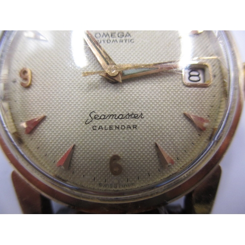 73 - An early 1960s Omega Seamaster automatic date watch, the dial measuring approx. 30mm, one owner from... 