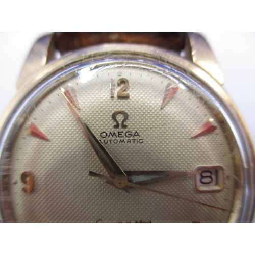 73 - An early 1960s Omega Seamaster automatic date watch, the dial measuring approx. 30mm, one owner from... 