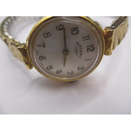 74 - Three vintage watches, to include a 9ct gold cased fob watch with yellow metal chain, an early 1970s... 