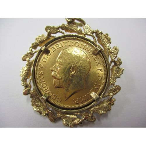 84 - A George V full gold sovereign dated 1913 in 9ct gold pendant mount, a circulated coin with good def... 