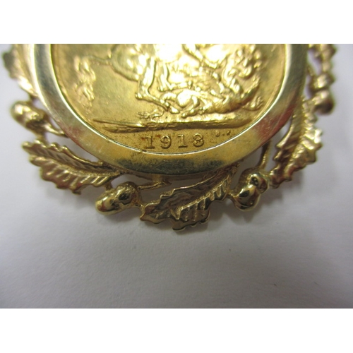 84 - A George V full gold sovereign dated 1913 in 9ct gold pendant mount, a circulated coin with good def... 