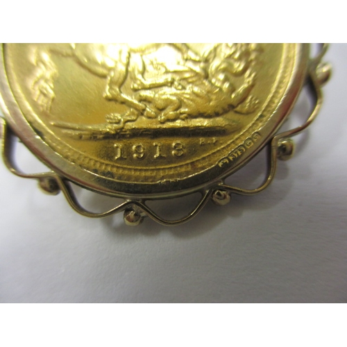 86 - A George V full gold sovereign dated 1913, in 9ct gold pendant mount, a circulated coin with good de... 