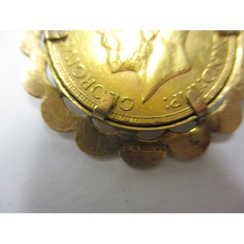 90 - A George V full gold sovereign dated 1930, in 9ct gold pendant mount, a circulated coin with good de... 