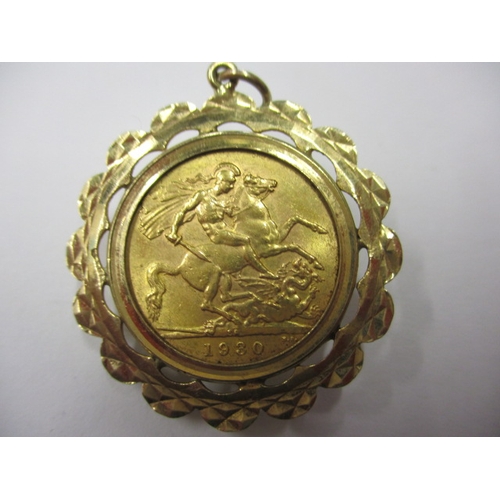 90 - A George V full gold sovereign dated 1930, in 9ct gold pendant mount, a circulated coin with good de... 