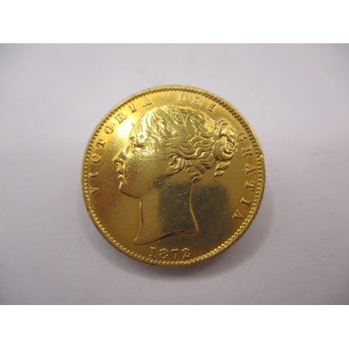 92 - A Victorian full gold sovereign dated 1872, having shield back, a circulated coin with very good def... 