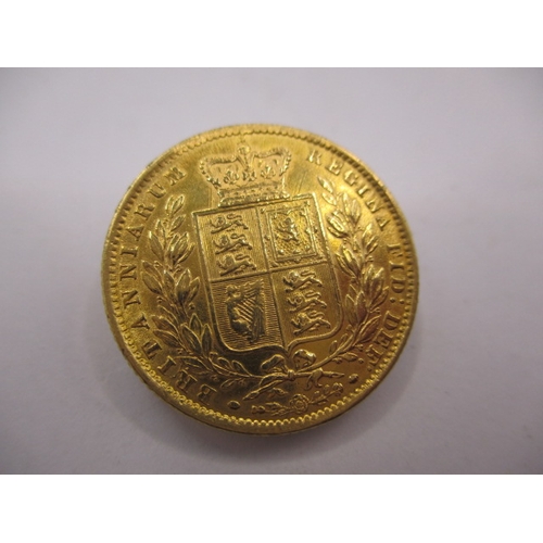 92 - A Victorian full gold sovereign dated 1872, having shield back, a circulated coin with very good def... 