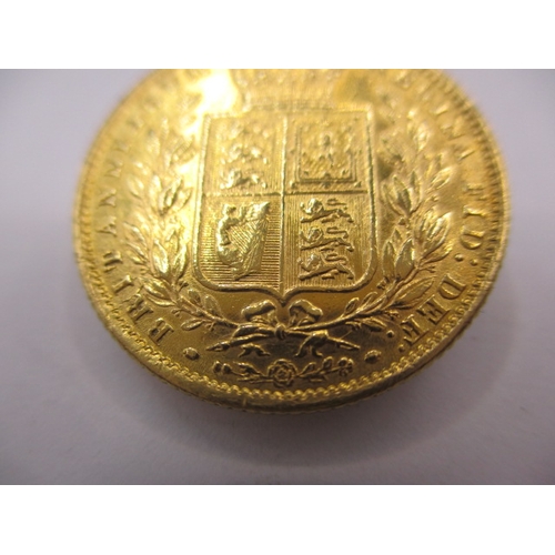 92 - A Victorian full gold sovereign dated 1872, having shield back, a circulated coin with very good def... 