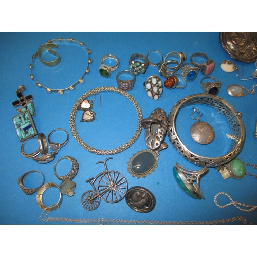 165 - A parcel of silver and white metal jewellery items and 2 silver spoons, all in used condition