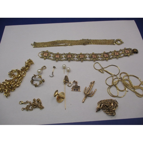 63 - A parcel of American gold and yellow metal jewellery items. Some damages, sold as scrap. Approximate... 