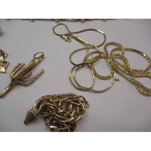 63 - A parcel of American gold and yellow metal jewellery items. Some damages, sold as scrap. Approximate... 