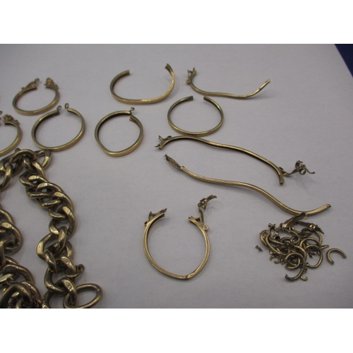 64 - A parcel of 9ct gold items, to include a good curb ling bracelet and coin mounts, damages so sold as... 