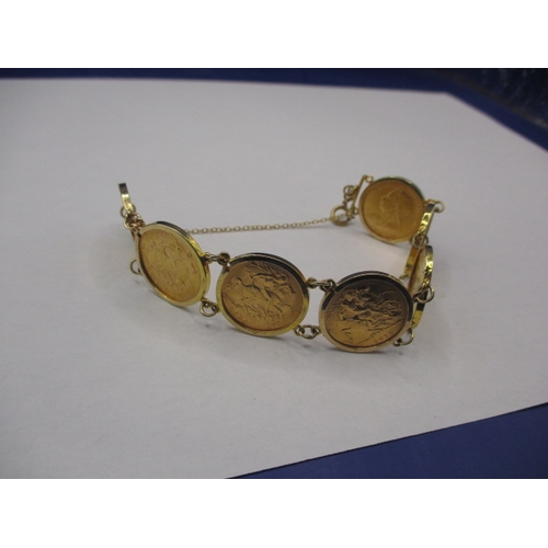 80 - A 9ct gold bracelet mounted with 7 gold half sovereigns, dates 1893-1894-1907-1910-1911-1913-1914, a... 