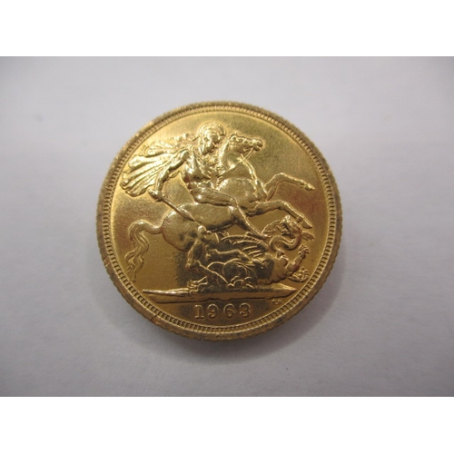 105 - A Queen Elizabeth II gold sovereign dated 1963, a good grade bullion coin with signs of being in a m... 