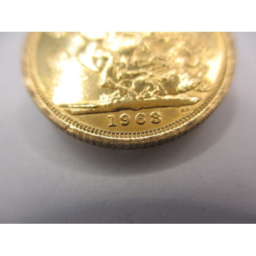 105 - A Queen Elizabeth II gold sovereign dated 1963, a good grade bullion coin with signs of being in a m... 