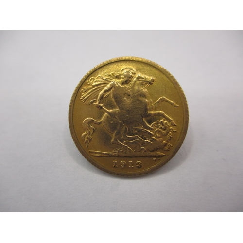 113 - A George V gold half sovereign dated 1913, a good grade bullion coin with fine definition of feature... 