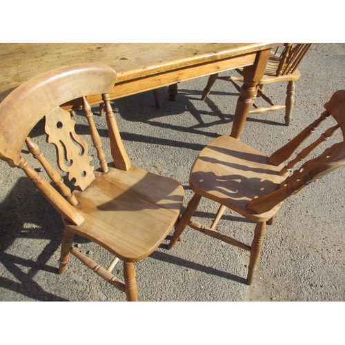 268 - A vintage country house kitchen table and chairs. 4+2 chairs, in pre-owned condition, one spindle mi... 