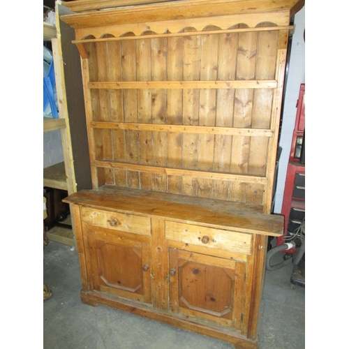 272 - An antique, farmhouse natural pine dresser of small proportions. In well used condition. Approximate... 