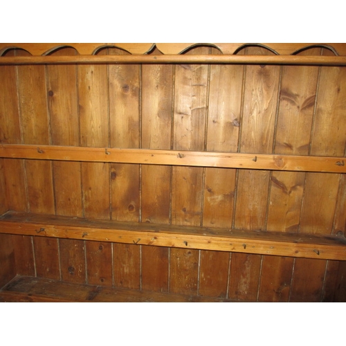 272 - An antique, farmhouse natural pine dresser of small proportions. In well used condition. Approximate... 