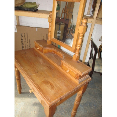 267 - A contemporary waxed pine dressing table, with removable top and mirror. In useable pre-owned condit... 