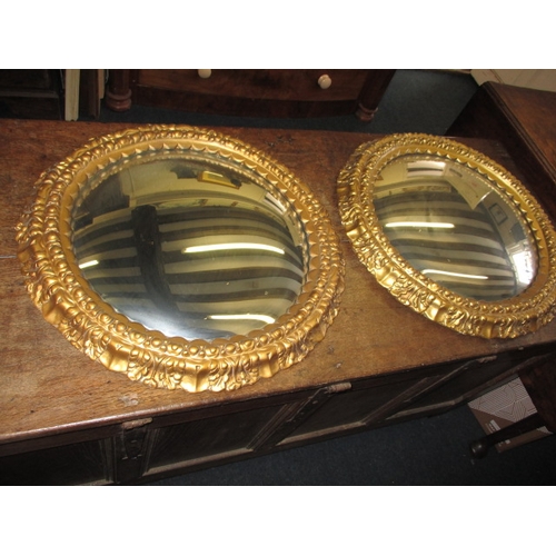 282 - A pair of vintage circular convex wall mirrors, approx. diameter 54cm, both in used condition with m... 