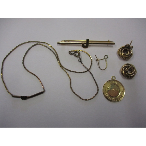 66 - A small parcel of gold and yellow metal items, all in used condition, approx. parcel weight 6g