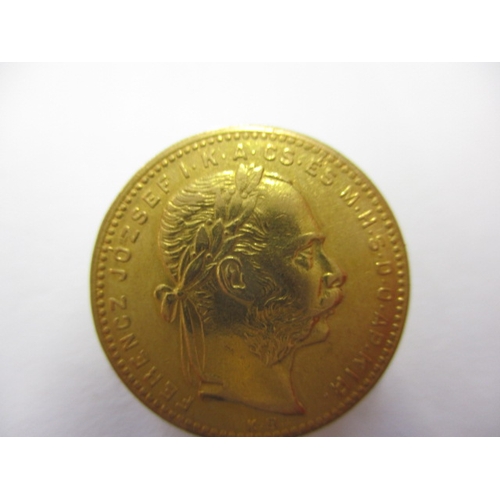 117 - An 1881 Hungarian 20 franc gold coin, approx. weight 6.4g in good circulated condition with fine def... 