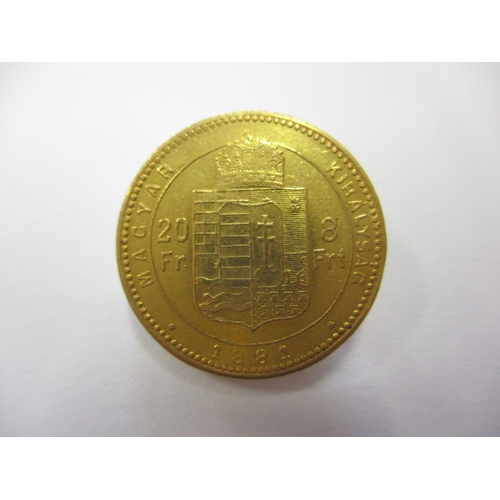 117 - An 1881 Hungarian 20 franc gold coin, approx. weight 6.4g in good circulated condition with fine def... 