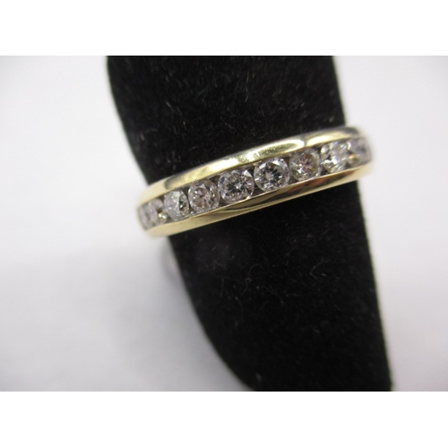 14 - An 18ct yellow gold diamond half eternity ring, approx. ring size ‘M+’, approx. weight 3.7g, in good... 