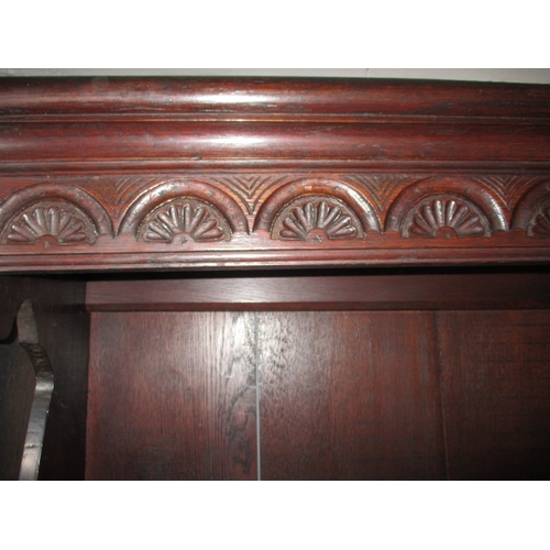 273 - An antique oak kitchen dresser, with removable top rack 3 frieze drawers, central dummy drawers and ... 