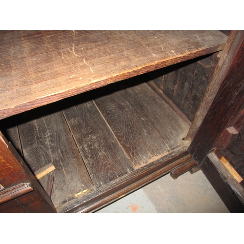 273 - An antique oak kitchen dresser, with removable top rack 3 frieze drawers, central dummy drawers and ... 