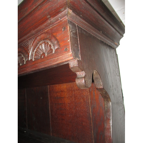 273 - An antique oak kitchen dresser, with removable top rack 3 frieze drawers, central dummy drawers and ... 