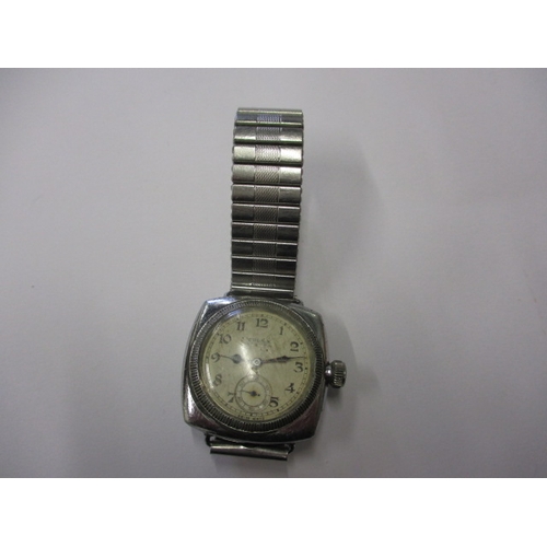 76 - An early 20th century gents Rolex Oyster cushion case wrist watch, runs when wound, having general u... 