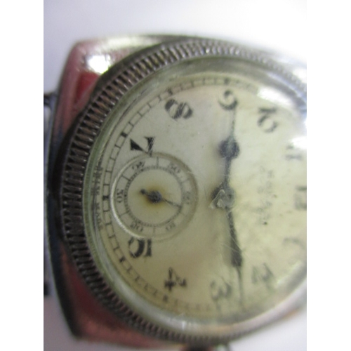 76 - An early 20th century gents Rolex Oyster cushion case wrist watch, runs when wound, having general u... 