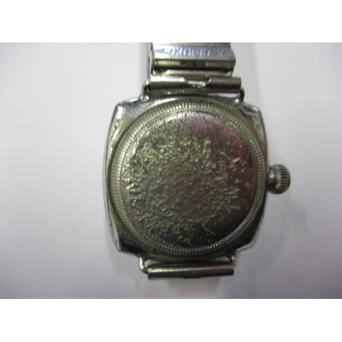 76 - An early 20th century gents Rolex Oyster cushion case wrist watch, runs when wound, having general u... 