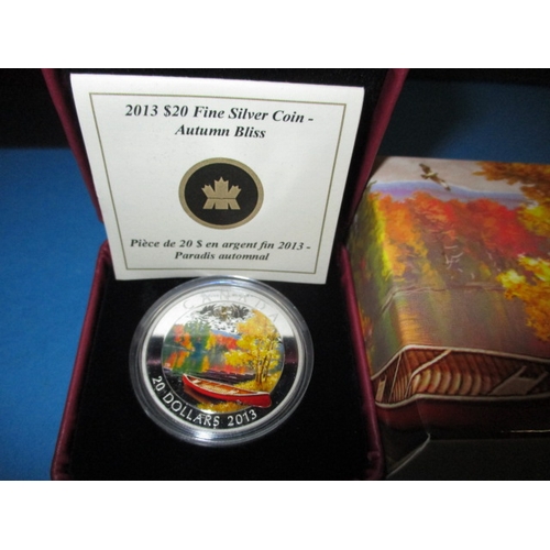 138 - A parcel of 925 silver collectors coins, to include a 10oz example, all in original presentation box... 