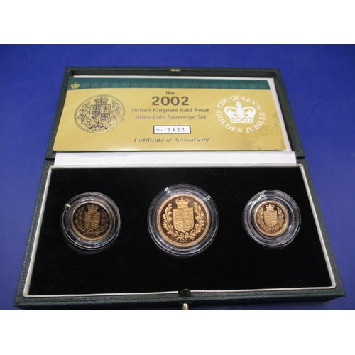 125 - A 2002 Royal Mint gold proof three coin sovereign set, consisting of Half sovereign, sovereign and d... 