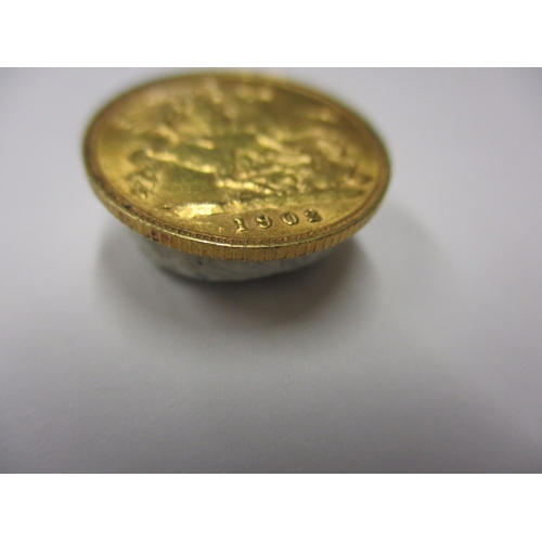 130 - An Edward VII gold half sovereign dated 1902, a circulated coin with good definition of features