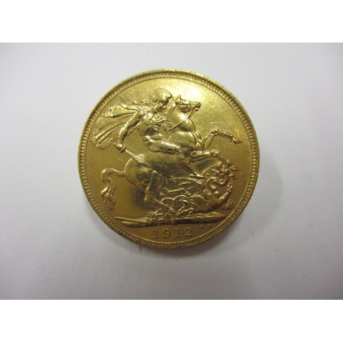 131 - A George V full gold sovereign dated 1912, a circulated coin with good definition of features