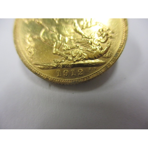 131 - A George V full gold sovereign dated 1912, a circulated coin with good definition of features