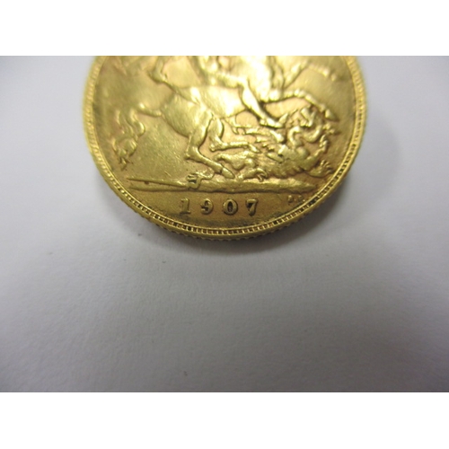 133 - A Edward VII gold half sovereign dated 1907, a circulated coin with good definition of features